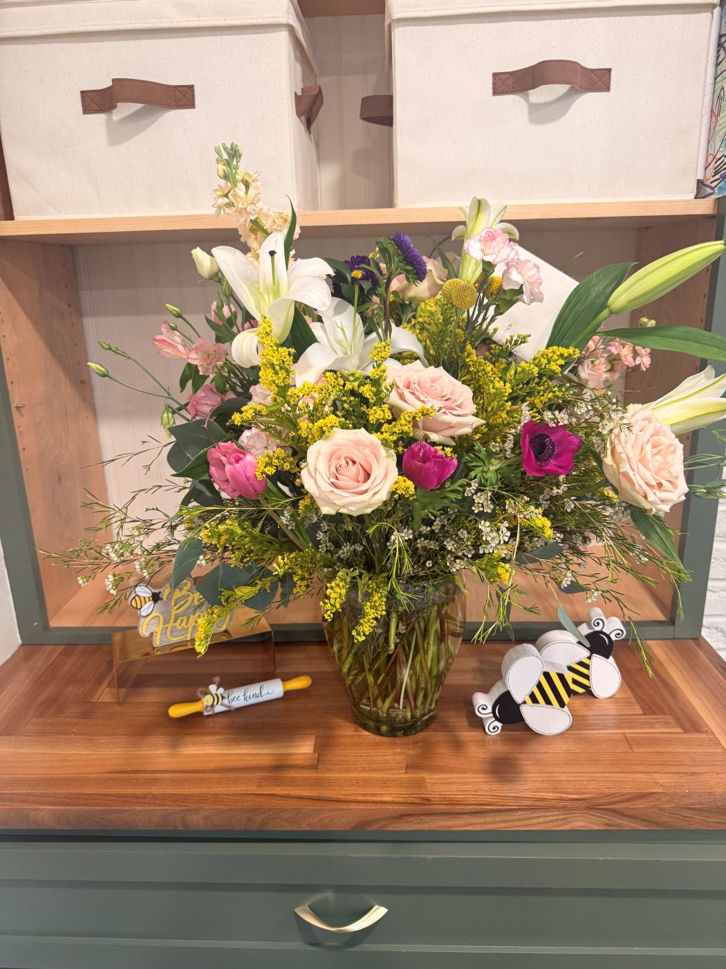 A handcrafted floral arrangement from the Be Yourself Flower Shoppe