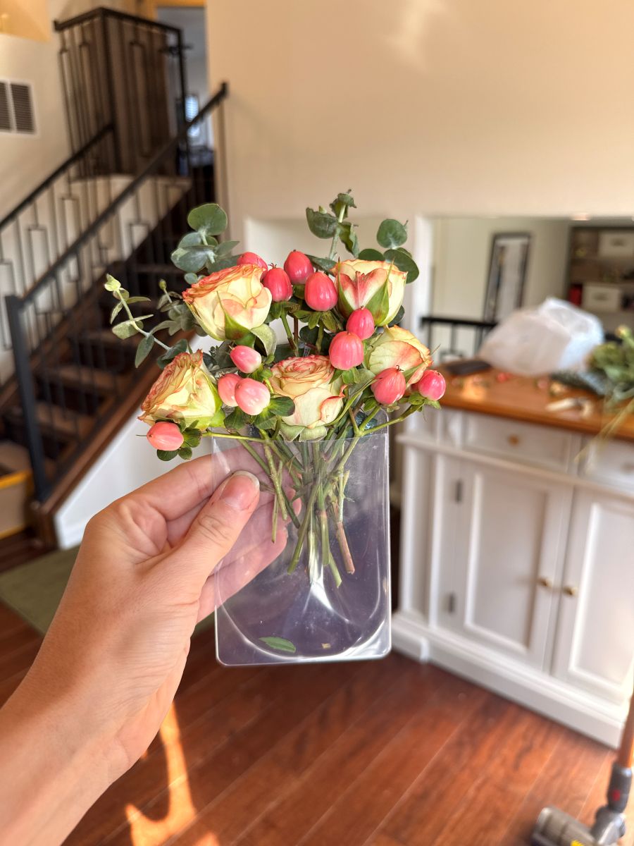 Petite bridesmaid arrangement of spray roses and berries